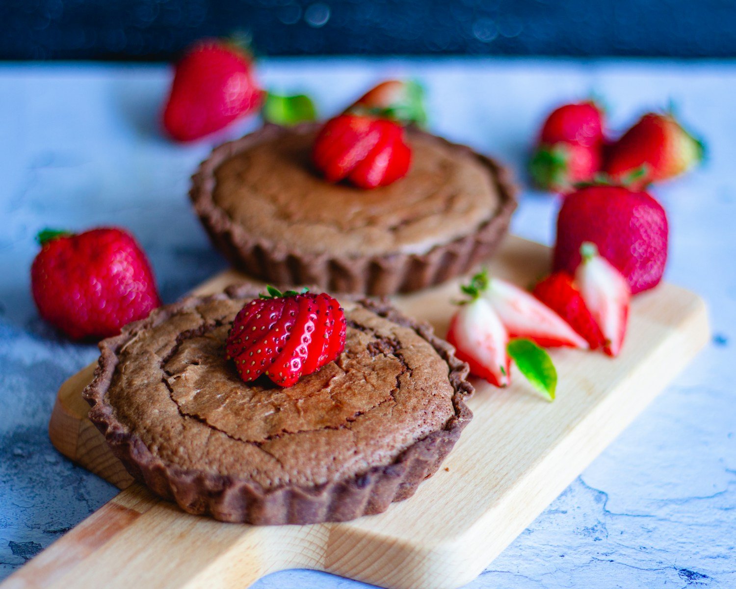 chocolate cupcake with strawberry on top