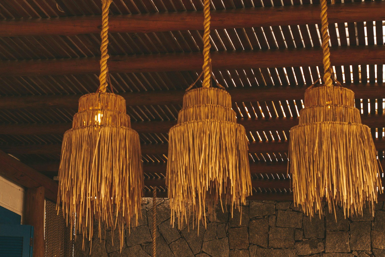 brown wooden hanging decor on brown wooden ceiling